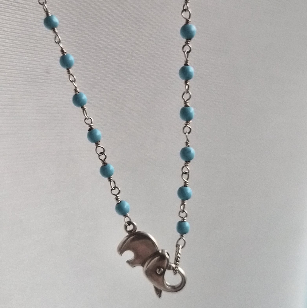 Beautiful faceted Turquoise Silver Necklace Ft. Elephant Clasp.